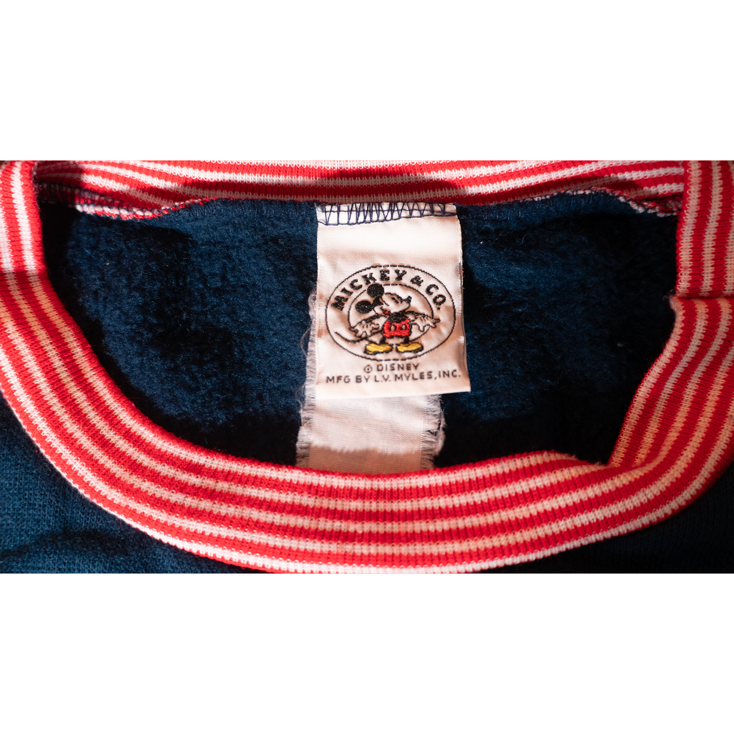 Mickey co.ミッキーのミニーちゃん顔ドン刺繍フリース