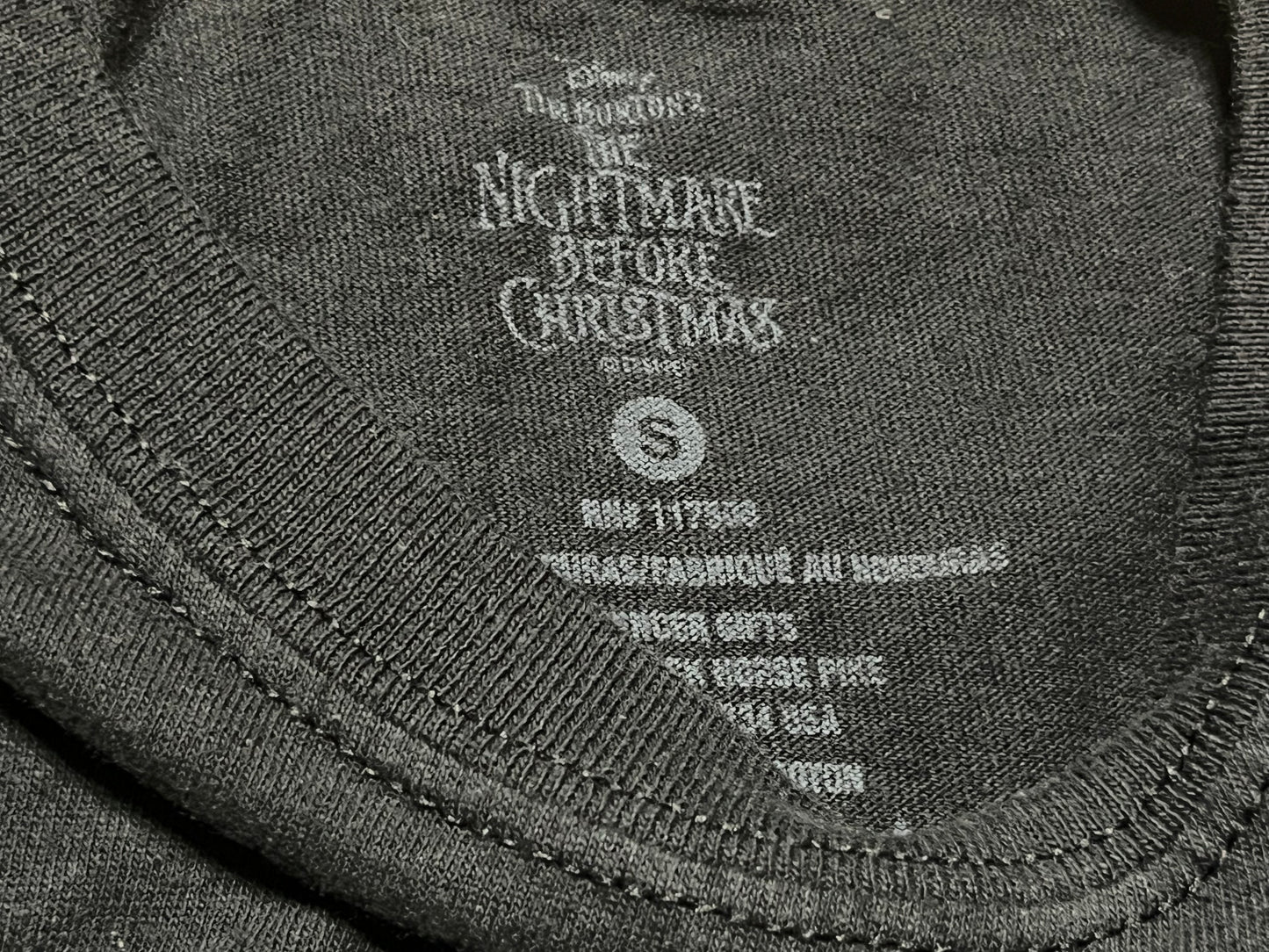 白フレームのパンプキンキングのTシャツ【ナイトメアー・ビフォア・クリスマス】