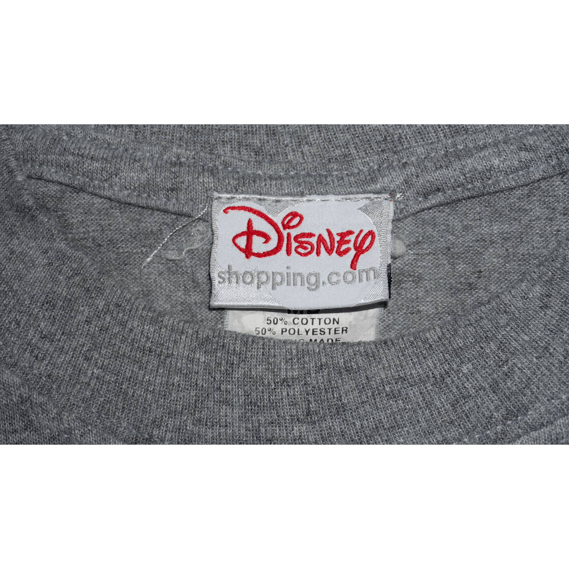 Disney label on a gray T-shirt made of 50% cotton and 50% polyester.